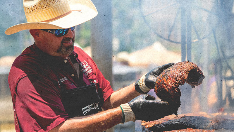 BBQ is lifted from a smoker